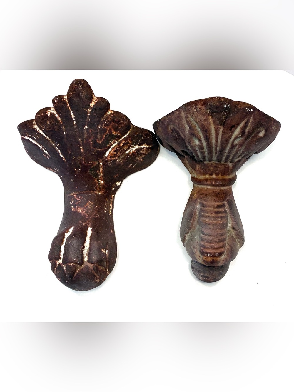 Antique cast iron ball-and-claw bathtub feet, Victorian-era